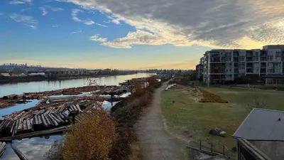 a river with a bunch of boats in the water at Spacious comfy stay in Richmond