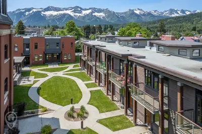 an aerial view of a campus with mountains in the background at 901 Fernie by StayIn in Fernie