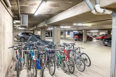 a bunch of bikes parked in a parking garage at 901 Fernie by StayIn in Fernie