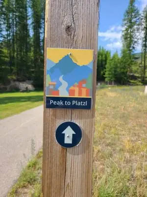 a sign on a pole on a telephone pole at Stemwinder Duplex Chalet by StayIn in Kimberley