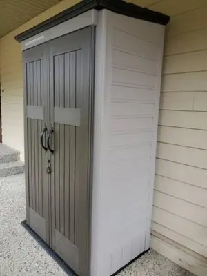 a garage door on the side of a house at Stemwinder Duplex Chalet by StayIn in Kimberley