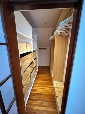 a room filled with lots of wooden boxes at 3 level, home near downtown! in Vancouver