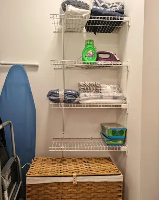 a walk in closet with towels and a basket at Bow River Cabin - Downtown - River Front - Free Street Parking in Calgary