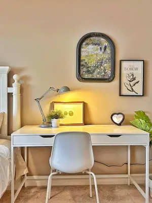 a yellow desk with a chair in a bedroom at Entire Beautiful and Cozy Home in Edmonton