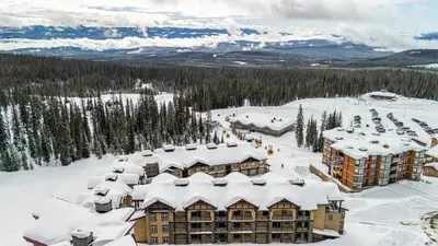an aerial view of a resort in the snow at Southpoint 25 Two Bdrm Ski In Out w Hot Tub in Big White