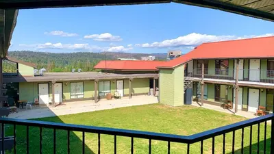a view from the balcony of a house at Hotel viewmont in Logan Lake