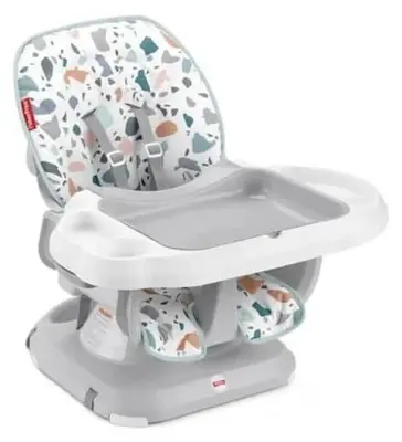 a baby seat with a cow pattern on it at Breathtaking Luxury 3Bd Penthouse Pool and Hot Tub in Canmore