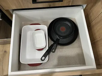 a pan and spatula in a white box at Elegant 3BD Home in Beaumont, Double Garage in Nisku