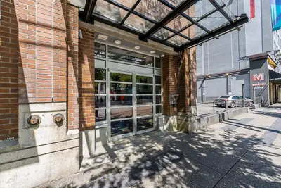 an entrance to a building with glass doors at Gorgeous Unit in the Heart of Downtown in Vancouver