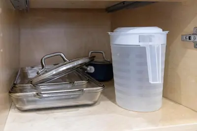 a plastic cup sitting next to a metal container at Vancouver Cozy Cove in Vancouver