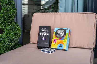 two books sitting on top of a bench at Miso 2 BD - Skyline View Patio Gym Pool & AC in Calgary