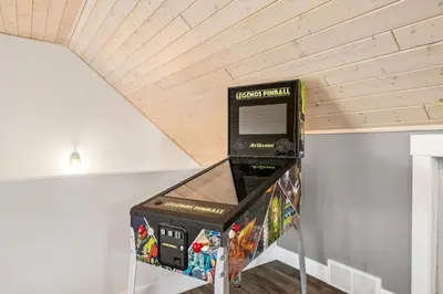 a room with a ceiling with a video game system at Radiant Retreat -Spacious Home - Heart of Radium! in Radium Hot Springs