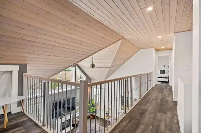 a wooden ceiling in a house with a staircase at Radiant Retreat -Spacious Home - Heart of Radium! in Radium Hot Springs