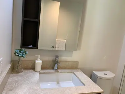 a bathroom with a sink and a toilet at Amazing brand new 2bedr&2bathr in Richmond center in Richmond