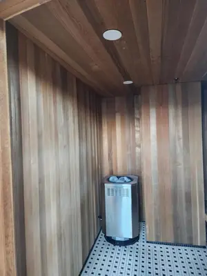 a small room with a trash can in a wall at Modern High-Rise 1 Bedroom Condo with water view near stadiums in Vancouver