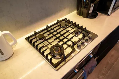 a stove top oven sitting on top of a counter at #Modern & Cozy 2BR 2BA in the Heart of Chinatown in Vancouver