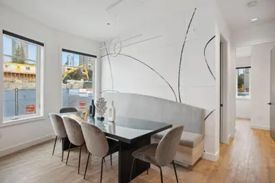 a dining room with a table and chairs at Luxury Downtown Vancouver Home Near Sunset Beach with Parking in Vancouver