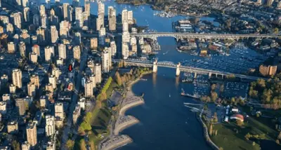an aerial view of a city with a bridge at Luxury Downtown Vancouver Home Near Sunset Beach with Parking in Vancouver