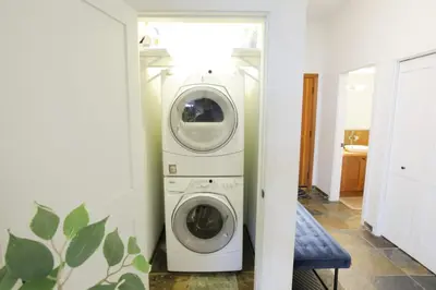 a washer and dryer in a room at Big Beach Escape - Ucluelet - Sleeps 6 - Pet Friendly in Ucluelet