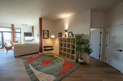 a living room with a couch and a table at Big Beach Escape - Ucluelet - Sleeps 6 - Pet Friendly in Ucluelet