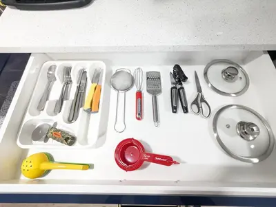 a drawer filled with lots of kitchen utensils at Chic 2BR Suite with Kitchen, Laundry, Near Elk Island & West Edmonton Mall in Edmonton