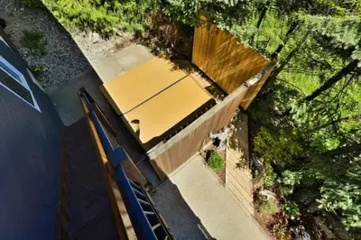 an overhead view of a house with a garage at Dog friendly Home on Ski Hill with Hot Tub by StayIn in Fernie