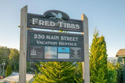 a sign for a feditz man street vacation rentals at Tofino Eco Waterfront Condo in Tofino
