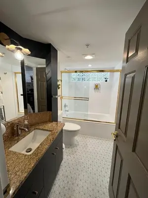 a bathroom with a sink and a toilet and a shower at Old Forest Resort Suite Heated Pool Hot Tub Sauna Beach Vancouver Island in Nanoose Bay