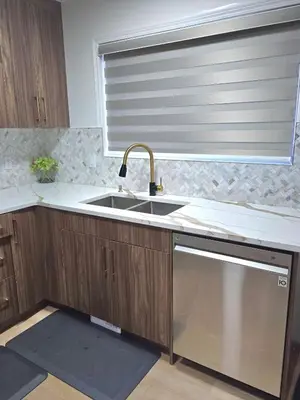 a kitchen with a sink and a window at Magnificent 3-Bed Home in Calgary