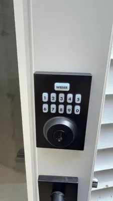 a ticket machine with a visa sign on it at Basement suite -Langley Willoughby in Langley