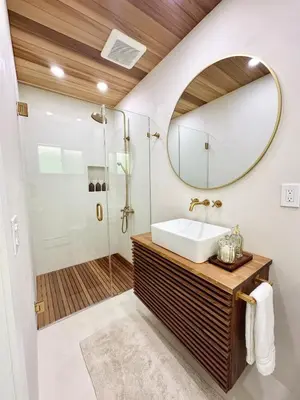 a bathroom with a sink and a mirror at Posada Nordica - a chic, tranquil mountainview suite in Hope
