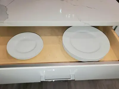two white toilets sitting on top of a shelf at Winter Deal! Stunning Ocean View Modern 1 BDR Private Entry Suite in Colwood