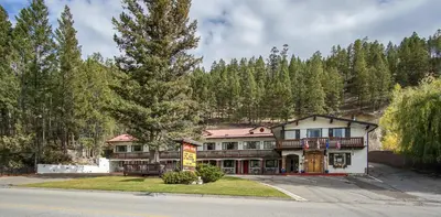 a large house in the middle of a road at Gables Motel in Radium Hot Springs