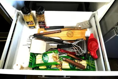 a drawer filled with lots of kitchen utensils at Mahogany Loft Retreat - 3 Story Home in Calgary