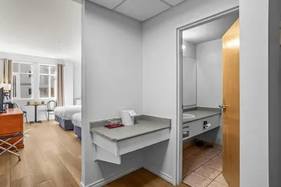 a bathroom with a sink and a mirror at Chic Mountain Hideout in Canmore DT Near Banff! in Canmore