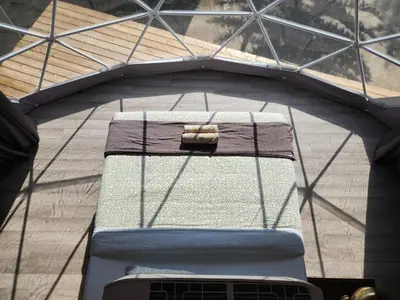 an overhead view of a swing set on a bridge at Alpenrose Dome Hottubs Mountains view sleep 4 in Golden