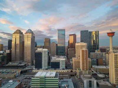 a city skyline with a lot of tall buildings at The Chic Downtown Residence | Luxe + Free Parking in Calgary