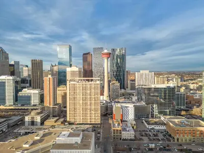 a view of a city with the space needle at The Chic Downtown Residence | Luxe + Free Parking in Calgary