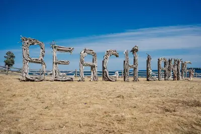 a sign that says drift on a beach at Victoria's Family Oceanside Retreat, brand new 2br basement in Colwood