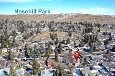 an aerial view of the town of noosh hill park at Quiet Family Friendly, 4 min UofC and University District Shops, 9 min DT in Calgary