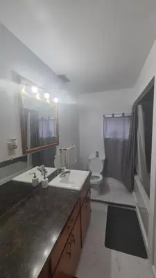 a bathroom with a sink and a toilet at The Peaceful Pines in Terrace