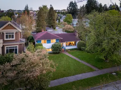 an aerial view of a house with a yard at Spacious Home with Indoor Pool in Vancouver