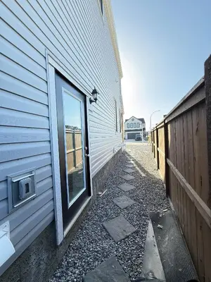 a door on the side of a building at Range View Retreat/2BR Suite in Calgary