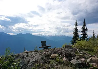 a laptop computer sitting on top of a mountain at Logden Lodge in Nelson