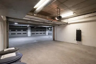 an empty parking garage with a bunch of garage stalls at Fitzsimmons Walk 16 by Outpost Whistler in Whistler