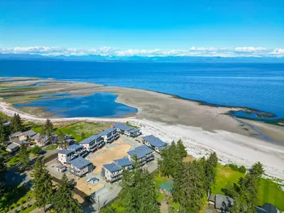 an aerial view of a resort on a beach at Family-Friendly Beachside Bliss in Oyster Bay