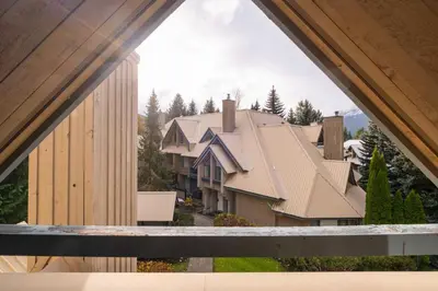 a view of a house from a window at Foxglove 16 by Outpost Whistler in Whistler
