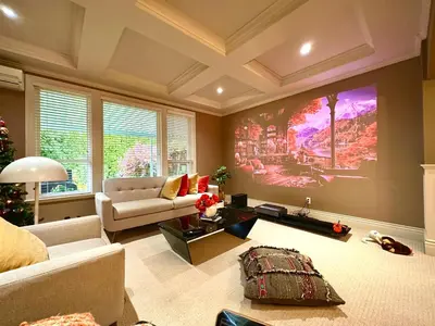 a living room with a large painting on the wall at Scorpio House Langley in Langley