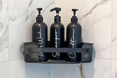 three wine bottles in a holder on a bathroom wall at RomanticStylish|FreeWifi|KingBed|WEM|parking in Edmonton