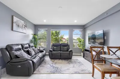 a living room with a couch and two chairs at Stylish 3BR, 2BA Vancouver Home in Vancouver